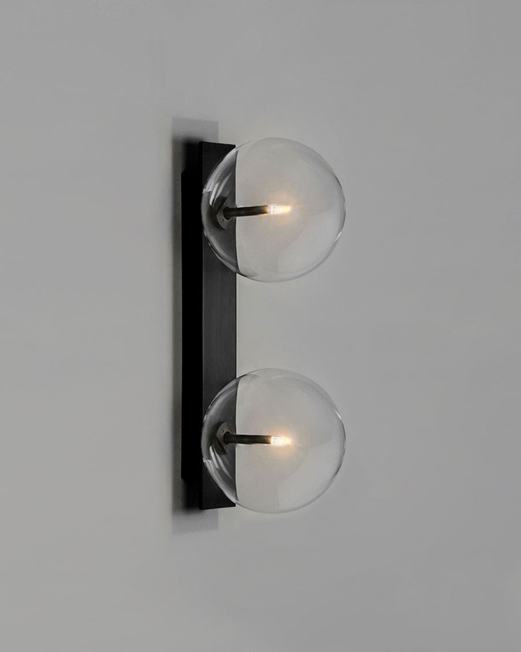 Schwung Oslo Dual Black Gunmetal Transparent Globe Wall Light